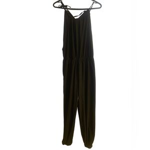 Black jumpsuit with slits on side of legs